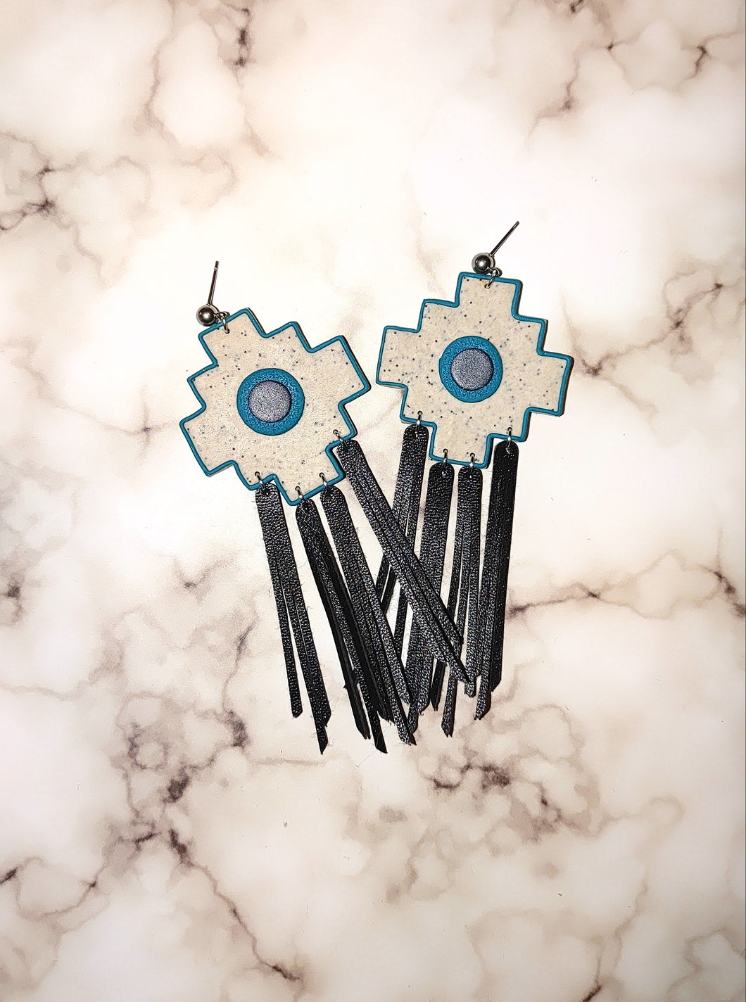 Aztec cross with leather tassels